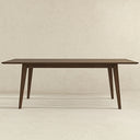 Front view of the Leroy 87-inch mid-century modern rectangular dining table in dark walnut wood, featuring a slim beveled tabletop and four angled, tapered legs against a neutral beige textured background.

