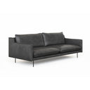 A three-quarter view of a black leather Linea Sofa with a minimalist design, featuring a sleek backrest and seat with metallic accents.