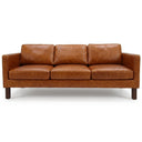 Mid-century modern three-seater sofa in cognac brown textured leather, featuring clean lines, track arms, and dark wooden block legs, isolated on a white background.