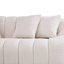 Close-up of the Mazi 84-inch white French bouclé sofa against a white background, featuring plush vertical channel tufting and two matching square throw pillows in soft, textured cream bouclé fabric.
