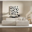 Melina 102-inch cream corduroy right-facing sectional sofa with accent pillows in a modern living room featuring geometric black-and-white wall art.