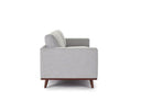Side view of a gray upholstered Olwyn Sofa with a full wood base and wide track arms, presented against a white background.