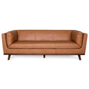 Phoenix cognac leather sofa in a mid-century modern style, featuring warm tan leather upholstery, bolster arm pillows, and a solid wood frame with tapered legs on a white background.