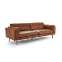 A three-quarter view of a brown leather  Rehan Sofa with a minimalist design, featuring a sleek backrest and seat with metallic accents.