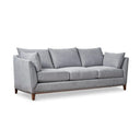 A three-quarters of a gray upholstered Taylor Sofa with subtly curved arms, a solid European beech hardwood base, and tapered dark brown legs.