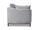 Rigt side of a gray upholstered Taylor Sofa with subtly curved arms, a solid European beech hardwood base, and tapered dark brown legs.