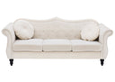 Beige sofa with tufted backrest and armrests on a white background