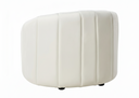 back side of an off-white armchair with quilted design on a white background